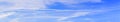 Panorama of the sky with beautiful clouds and traces of aircraft Ã¢â¬â a wide panoramic view in high resolution and high quality Royalty Free Stock Photo